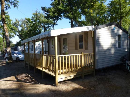 Mobile-home Standard 22-28m² - 2 bedrooms - sheltered terrace + TV