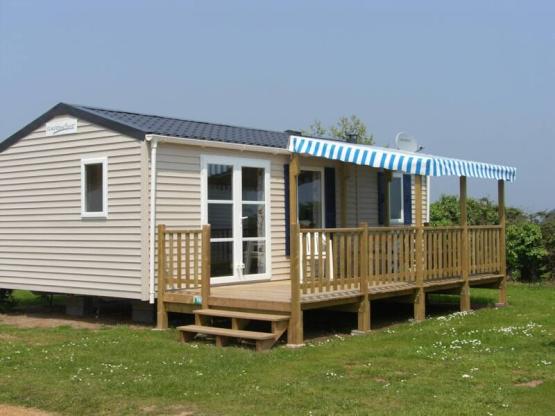 Mobile home 31m² avec suite parentale + terrasse semi-couverte 15m² - Petite vue mer
