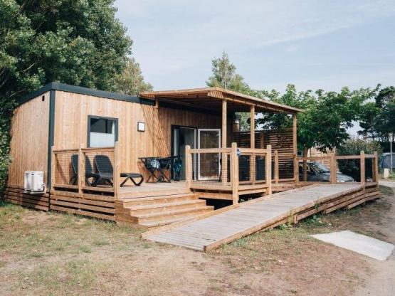 Homeflower Premium 29m² Wheelchair - 2 bedrooms + semi-covered terrace + TV + sheets + towels + CLIM