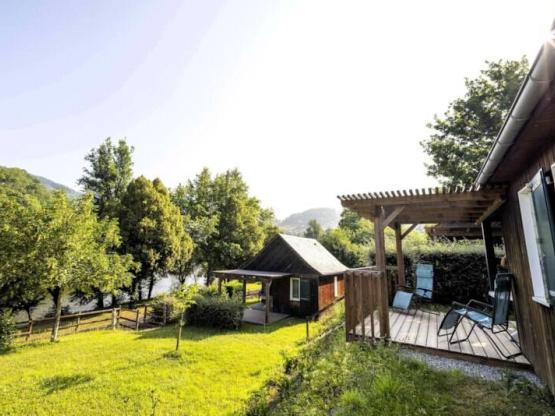 Chalet 32m² / 2 bedrooms with a large terrace overlooking the river Lot.