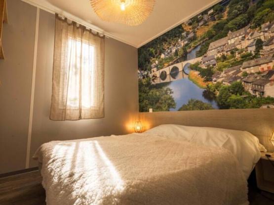 Chalet 32m² / 2 bedrooms with a large terrace overlooking the river Lot.