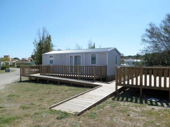 Mobile home Mistral 32m² (2 bedrooms) sheltered terrace + TV - Wheelchair friendly